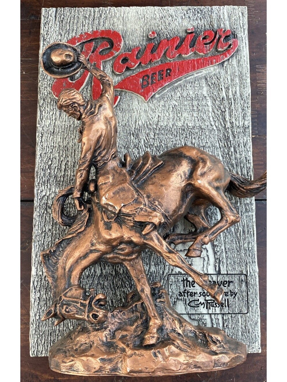 VTG Rainier BEER - the Weaver after sculpture by CM Russell - plastic sign 70’s